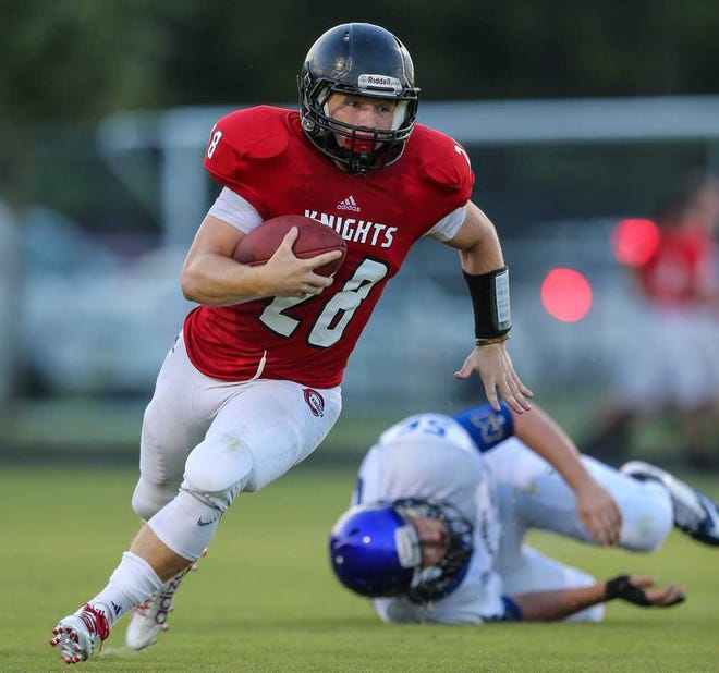 GARY MCCULLOUGH/CORRESPONDENT Creekside's Connor Cline runs the ball against Pedro Menendez during the first half of high school pre-season football action at Creekside High School in St. Johns, Fla., Friday, August 21, 2015.