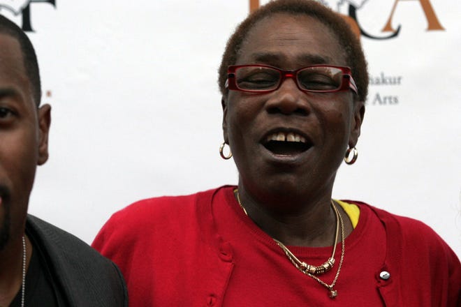 Afeni Shakur, mother of the late Tupac Shakur, attends the 2Pac 40th Birthday Concert Celebration in Atlanta. Afeni Shakur has died. She was 69 years old. The Marin County, California, Sheriff’s Department confirmed her death. .(AP Photo/ Ron Harris)
