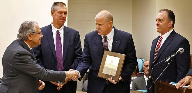 Massachusetts State Trooper Eric Benson, center, receives the Trp. Mark Charbonnier Awards for his 22-month investigation into the Odin Lloyd murder my Aaron Hernandez. From left, Speaker Robert DeLeo, Colonel Richard McKeon, Trooper Benson and Lt. Detective Kenneth Halloran.
Law Day 2016 at Quincy District Court on Tuesday, May 03, 2016. Greg Derr/ The Patriot Ledger.