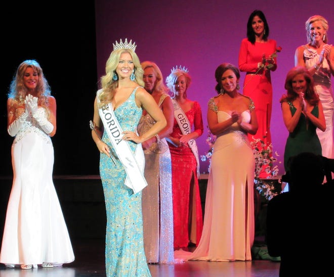 Taking her first walk, Ms. Woman Florida 2016, Katie Hill at the Ms. and Mrs. Florida-Georgia United States Pageant at the Flagler Auditorium. NEWS-TRIBUNE PHOTOS/DANIELLE ANDERSON