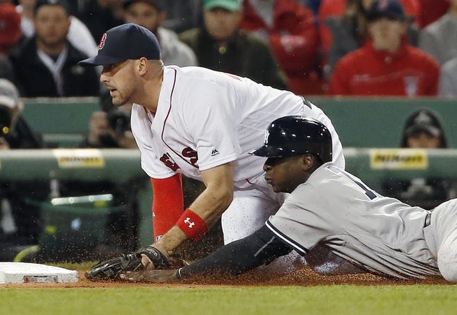 As good as Travis Shaw has been at the plate, he's been equally impressive at third base this season. AP Photo/Michael Dwyer