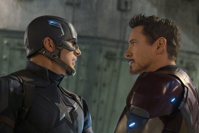 Captain America/Steve Rogers (Chris Evans) and Iron Man/Tony Stark (Robert Downey Jr.) face off in “Captain America: Civil War” (Marvel Studios).
