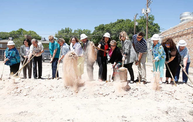 Lubbock Meals on Wheels board and staff members break ground on the building expansion and renovation project during a ceremony Thursday, May 5, 2016, in Lubbock.