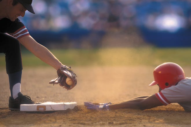 The pace of a baseball game can lend itself to good conversation. [Comstock/Thinkstock]
