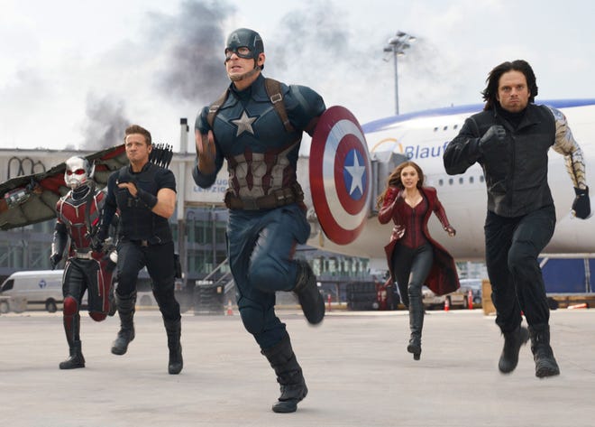 From left, Paul Rudd, Jeremy Renner, Chris Evans, Elizabeth Olsen and Sebastian Stan star in "Captain America: Civil War." The Associated Press