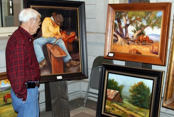 Jamie Mitchell • Times Record - Jim Grubb looks over the work of painter Louise Harris on display, Saturday, May 17, 2014, during the Fort Smith Western Heritage Month art show in the Frisco Station. 
 Area artist Dell Eddins, creator of this painting, "Bell," will be among the artists featured at the Art on the Border show and fundraiser, which will be held from 10 a.m. to 5 p.m. May 28 at the Old Frisco Station near Garrison Avenue. The event is part of the Fort Smith Wetern Heritage Month celebration and will raise money for the Donald W. Reynolds Cancer Support House, the Children‘s Emergency Shelter and the U.S. Marshals Museum. Photo Cour 
 Area artist Julie Mayser‘s creation, "Afternoon Glow," is one of the pieces of art that will be featured at this year‘s Art on the Border event, which begins at 10 a.m. May 28 at the Old Frisco Station. The event is part of Fort Smith Western Heritage Month and will raise money for the Children‘s Emergency Shelter, the Donald W. Reynolds Cancer Support House and the U.S. Marshals Museum. Photo courtesy Art on the Border 
 JAMIE MITCHELL Ã¾Ã?¢ TIMES RECORD Sean Horne, from left, Jim Horne and Dr. Suzanne Horne visit with artist Donna Sisco, Friday, May 15, 2016, during the gala opening of the second annual Western Heritage Art Show and Sale in the old Frisco Station rail depot. Sponsored by the Charitable Classic Foundation, the show features western art and photography and will be open Saturday, May 16, 2015, 10-5 p.m.