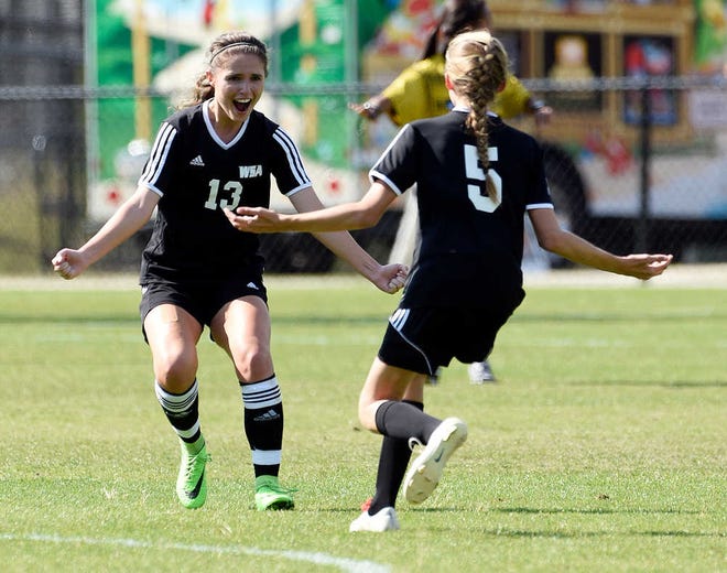 Westminster's #13 Daria Stan celebrates after scoring a goal during the GISA semifinals at Blanchard Woods Park.