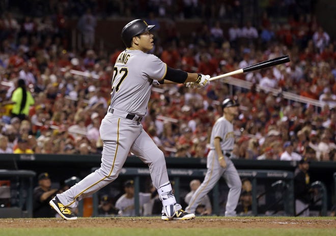 The Pirates' Jung Ho Kang watches his two-run home run during the sixth inning of a baseball game against the St. Louis Cardinals Friday in St. Louis.