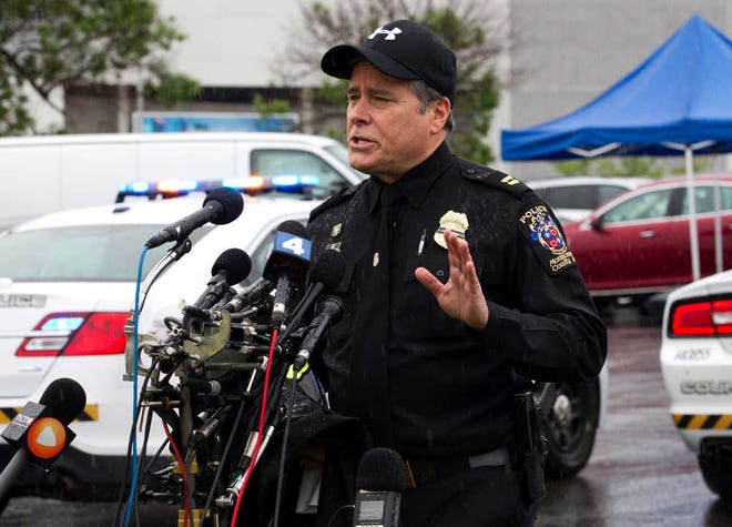 Montgomery County Police Captain Paul Starks speaks to the media at the parking lot, outside the Westfield Montgomery Mall in Bethesda, Md., Friday, May 6, 2016. Police say three people were hurt in the shooting. (AP Photo/Jose Luis Magana)