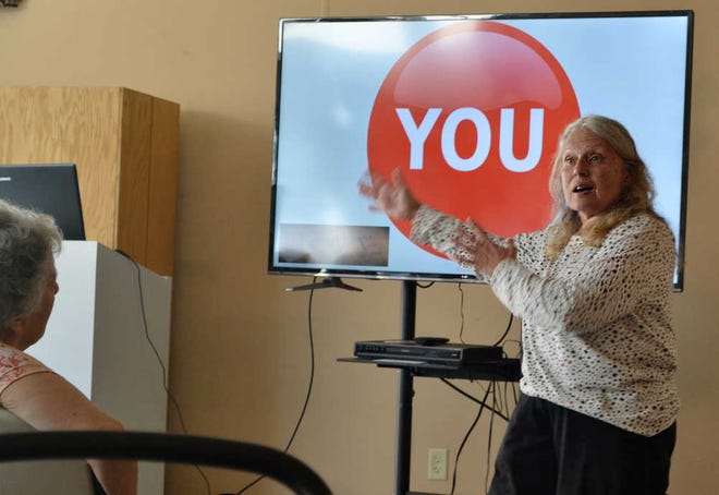 Karen Solheim, president of the Georgia Association of Educators-Retired, speaks about the proposed state takeover of schools at a forum held at Universalist Unitarian Fellowship of Athens on Sunday, March 8, 2016. (Hilary Butschek/Staff) OnlineAthens