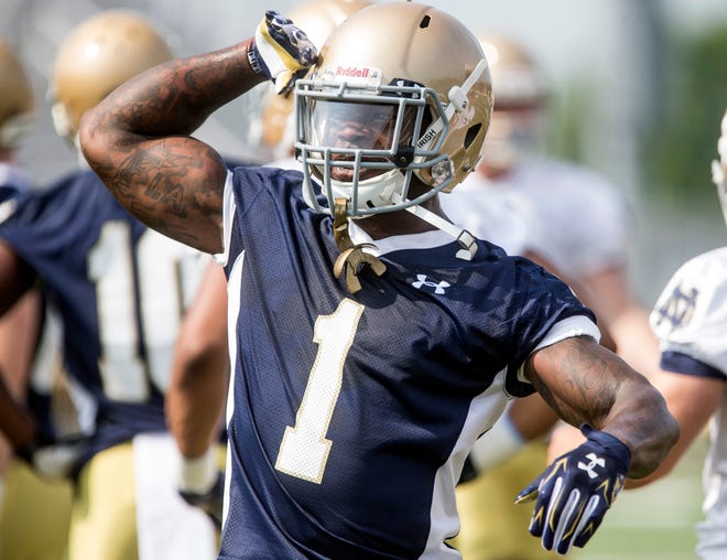 In this Aug. 4, 2014, file photo, Greg Bryant salutes a teammate while playing for Notre Dame.