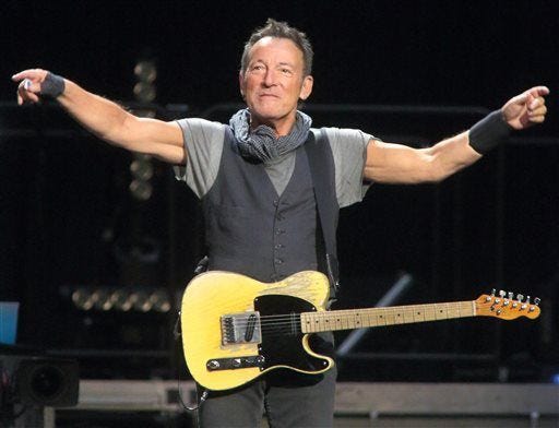 FILE - In this April 20, 2016 file photo, Bruce Springsteen performs in concert with the E Street Band during their The River Tour 2016 at the Royal Farms Arena in Baltimore.  (Photo by Owen Sweeney/Invision/AP, File)