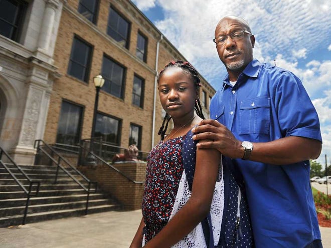 Will.Dickey@jacksonville.com Tim Sloan's daughter, Ty'Meisha, 12, attends Landon Middle School. Sloan says not every student should necessarily be steered toward Stanton College Preparatory School for academically gifted students. "If a parent knows that his or her child is not ready for the rigorous curriculum, I applaud that parent," he said.
