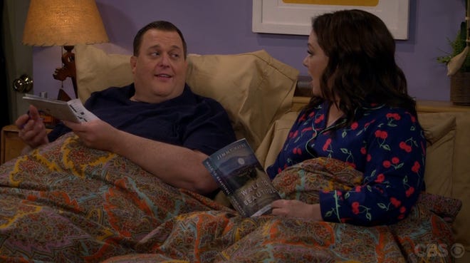 Actress Melissa McCarthy holds Jimmy Wayne's autobiography "Walk to Beautiful" in a May 2 episode of the CBS sitcom "Mike and Molly." Photo courtesy of CBS.