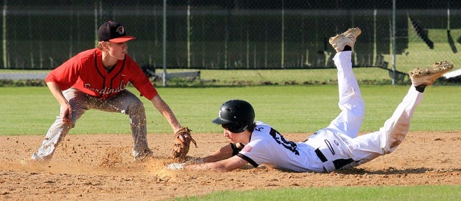 Havelock's Drew Simcox slides safely into second base during Saturday's game against Jacksonville at Havelock High. The Rams won the game 9-1, clinching second place in the Coastal 3A Conference.