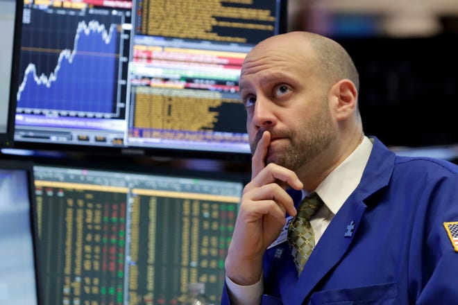 Specialist Meric Greenbaum works on the floor of the New York Stock Exchange, Monday, May 9, 2016. U.S. stocks are starting the week slightly higher following two weeks of losses. Weak economic reports from China are pushing the prices of fuels and precious metals lower. (AP Photo/Richard Drew)