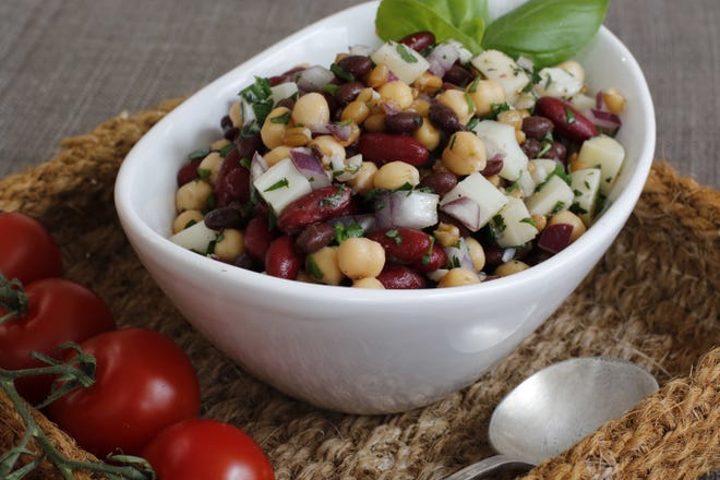 In this version of three-bean salad, f spelt and canned hearts of palm adds tons of interest. ASSOCIATED PRESS