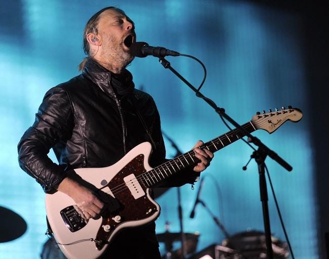 Thom Yorke is the frontman of Radiohead, which has recently released a new song, "Burn the Witch," ahead of its tour scheduled to kick off later in the month. (The Associated Press)