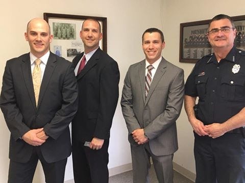 Promoted to detectives on Monday were Portsmouth police officers (from left to right) Seth Tondreault, Erik Widerstrom and Eric Benson. Shown with them is interim Police Chief David Mara. Courtesy photo.