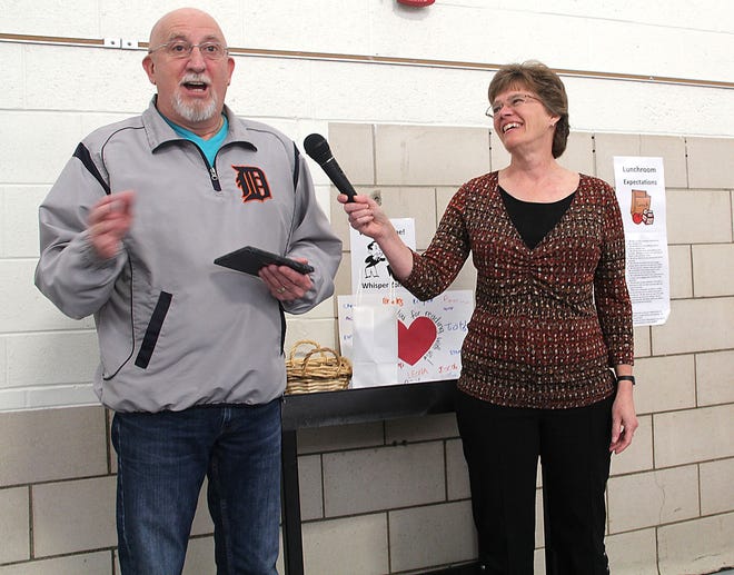 Ken Dirling talks about his experience with the Buddy Reading program at Williams Elementary Schoolo after Kathy Kelley presents him with the Volunteer of the Year award. ANDY BARRAND PHOTO
