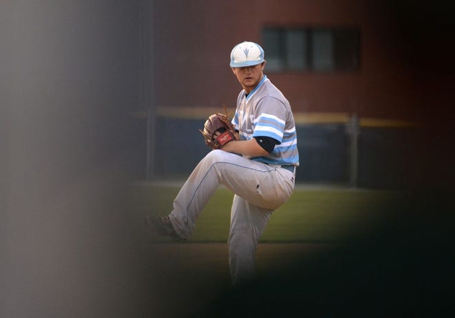 South Lenoir pitcher Hunter Winfield winds up for a pitch early in Tuesday's home playoff game against Ayden-Grifton.