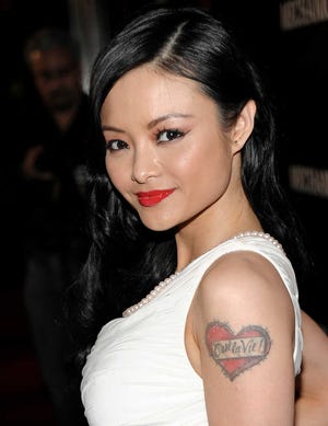FILE - IN this Jan. 25, 2011 file photo, Television personality Tila Tequila arrives at the premiere of the feature film "The Mechanic" in Los Angeles. The reality TV star has spoken highly of Donald Trump and could provide entertainment at one of his events. (AP Photo/Dan Steinberg)