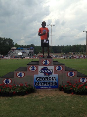 Cedar Shoals' Rogerous Swain won the Class AAAAA triple jump at the Georgia Olympics in Jefferson Thursday.