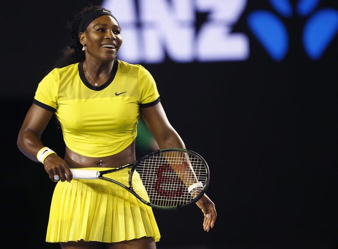 FILE - In this Jan. 28, 2016, file photo, Serena Williams smiles during her semifinal match against Agnieszka Radwanska of Poland at the Australian Open tennis championships in Melbourne, Australia. Top-ranked Williams recounted Sunday, May 8, how she came to have a part in the Beyonce's video, "Lemonade." (AP Photo/Rafiq Maqbool, File)