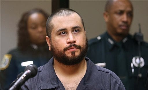 In this 2013, file photo, George Zimmerman, acquitted in the high-profile killing of unarmed black teenager Trayvon Martin, listens in court, in Sanford, Fla., during his hearing. The pistol former neighborhood watch volunteer Zimmerman used in the fatal shooting of Martin is going up for auction online.