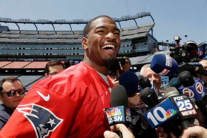 New England Patriots rookie quarterback Jacoby Brissett speaks with members of the media on the field at Gillette Stadium, Wednesday, May 11, 2016, in Foxboro.
