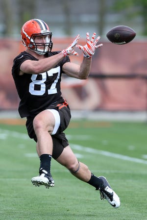 Cleveland Browns' Seth DeValve (87) catches a pass during NFL football rookie camp at the practice facility Friday, May 13, 2016, in Berea, Ohio. (AP Photo/Ron Schwane)