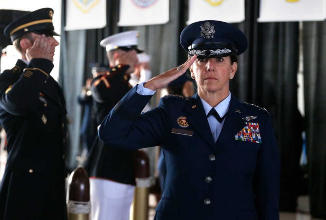 Air Force Gen. Lori J. Robinson, the incoming commander of the North American Aerospace Defense Command and U.S. Northern Command, salutes during her arrival at the change of command ceremony, at Peterson Air Force Base, in Colorado Springs, Colo., Friday, May 13, 2016. Gen. Robinson is the first woman to lead a top-tier U.S. military command after taking charge Friday at NORAD and USNORTHCOM. (AP Photo/Brennan Linsley)