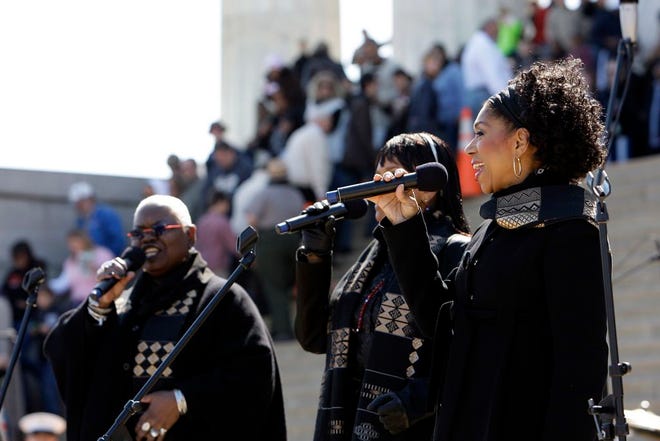 Sweet Honey in the Rock performs during an event to commemorate Marian Anderson's performance 70 years ago, at the Lincoln Memorial in Washington. (AP Photo/Alex Brandon)