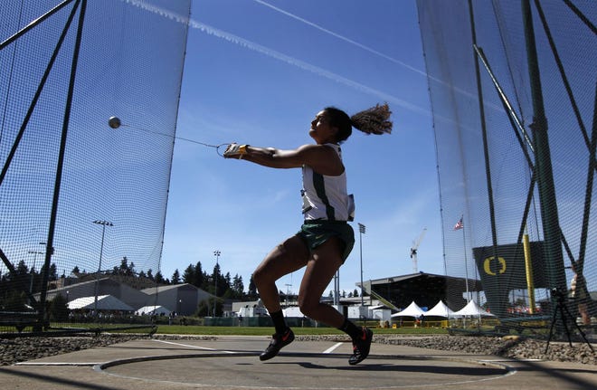 Oregon's Jillian Weir throws in the finals of the Women Hammer Throw on the first day one of the NCAA Track and Field Championships at Hayward Field in Eugene. (Chris Pietsch/The Register-Guard)