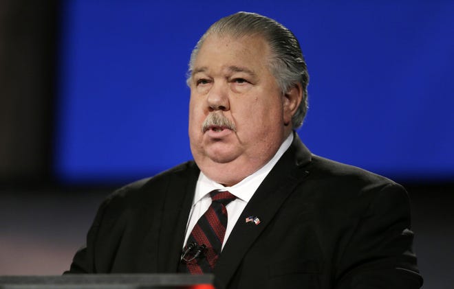 FILE - In this April 24, 2014 file photo, Sam Clovis speaks in Johnston, Iowa. Clovis signed on with Donald Trump in August, after quitting former Texas Gov. Rick Perry's struggling campaign. At the time, the move prompted more than a few raised eyebrows in the state's Republican circles, but Clovis says now that his instincts were right. (AP Photo/Charlie Neibergall, File)