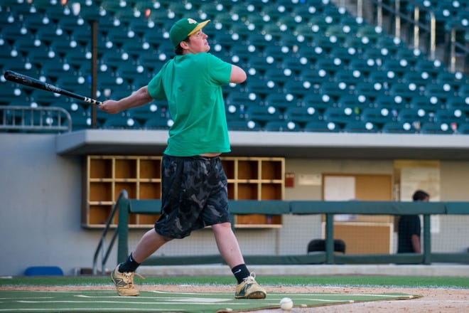 Bessemer City's Luke Gibby competes in Sunday's high school home run derby at the Charlotte Knights' BB&T Ballpark. PHOTO COURTESY OF LAURA WOLFF/CHARLOTTE KNIGHTS.