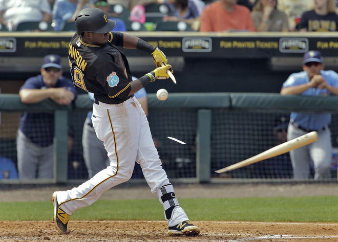 Pirates' Alen Hanson shatters his bat as he fouls off a pitch from Rays' Blake Snell during the fifth inning of a spring training game March 11 in Bradenton, Fla.