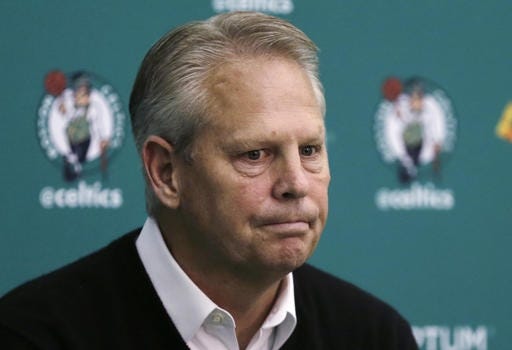 Boston Celtics President of Basketball Operations Danny Ainge pauses while answering a reporter's question Tuesday in Walham, Mass. The team was awarded the third NBA draft pick in the lottery. The Celtics have never won the first pick in the draft. AP photo