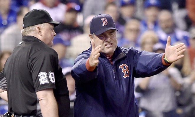 John Farrell argues with home-plate umpire Bill Miller after being ejected from the game in the seventh inning.