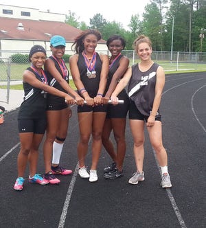 Six members of Havelock's track and field team will compete at Friday's NCHSAA 3A championships in Greensboro. They are, from left to right: Alera Jackson, Nydia Brown, Nyesha Patillo, Olivia Kinsey and Adrianna Hagel. Not in photo is Justin Wears.