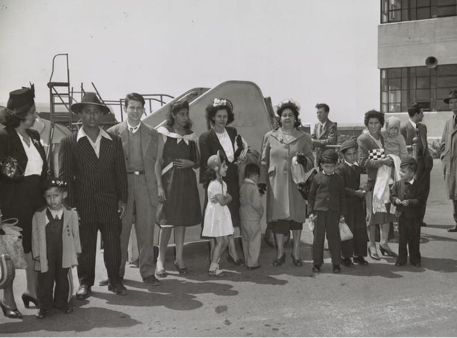 The American population was reshaped by Latino immigration starting in 1880 and continuing into the 1940s: Cubans, Mexicans and Puerto Ricans begin arriving in the U.S. and start to build communities in South Florida, Los Angeles and New York. Above, a group of Puerto Ricans arrive at Newark airport, 1947. 

Courtesy of the Library of Congress Prints & Photographs Division