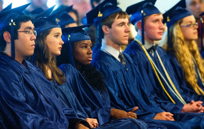PETER.WILLOTT@STAUGUSTINE.COMSt. Johns Virtual School graduating seniors listen to a speaker during their commencement held in the school district's administration building in St. Augustine on Wednesday, May 18, 2016.