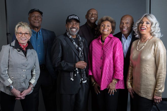 The original cast of "Roots," including Sandy Duncan, from left, John Amos, Ben Vereen, Louis Gossett Jr., Leslie Uggams, Georg Stanford Brown and Lynne Moody, pose for a portrait to promote the upcoming release of "Roots: The Complete Original Series," which will be released June 7 on Blu-ray. The Associated Press