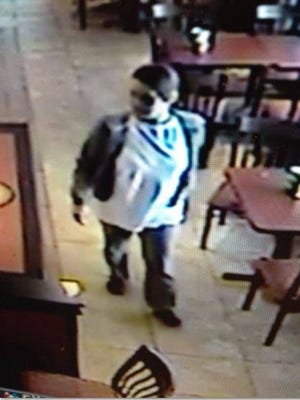 Mount Laurel police say this woman stole a game console and games from an employee area at Moe's Southwest Grill on Nixon Drive on May 16, 2016.