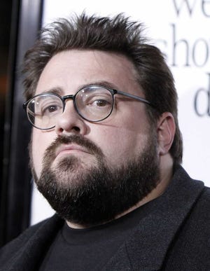 FILE - In this Oct. 20, 2008 file photo Kevin Smith arrives at the premiere of "Zach and Miri Make A Porno" in Los Angeles. (AP Photo/Matt Sayles, File)