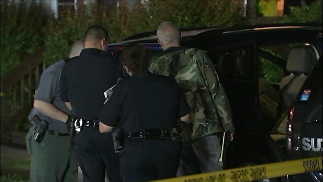 Mount Holly Police officers investigate a shooting of a teenager Thursday night. Photo by WSOC-TV.Mount Holly