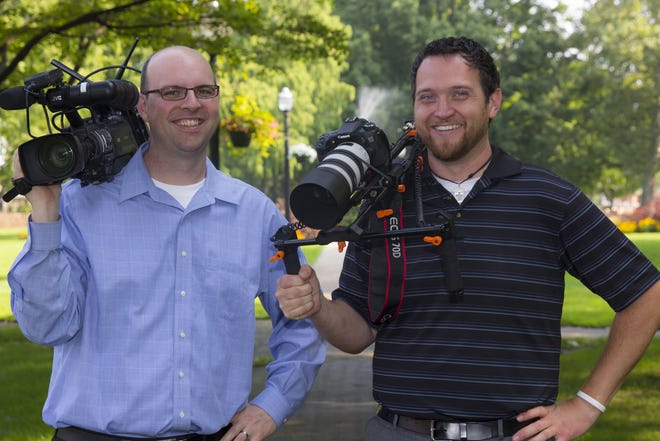 City of Holland multimedia specialists Kevin Lee, left, and Eric Bruskotter, prepare prepare to shoot video. Contributed.