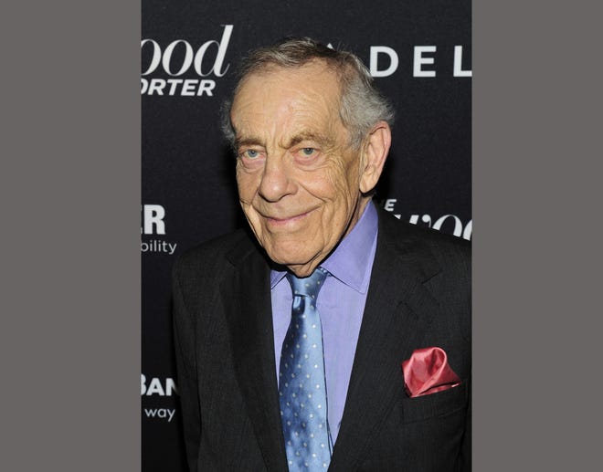 FILE - In this April 10, 2013 file photo, CBS “60 Minutes” correspondent Morley Safer appears at The Hollywood Reporter Celebrates the 35 Most Powerful People in Media in New York. Safer, the veteran "60 Minutes" correspondent who exposed a military atrocity in Vietnam that played an early role in changing Americans' view of the war, died Thursday, May 19, 2016. He was 84. (Charles Sykes/ The Hollywood Reporter via AP)