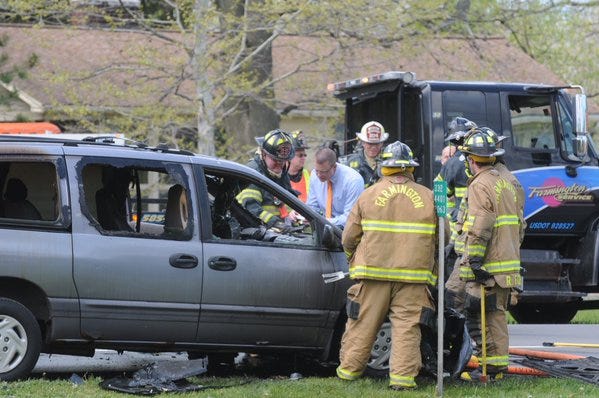 Farmington and Canandaigua firefighters deal with a vehicle fire on Route 332 on Thursday afternoon. JACK HALEY/MESSENGER POST MEDA