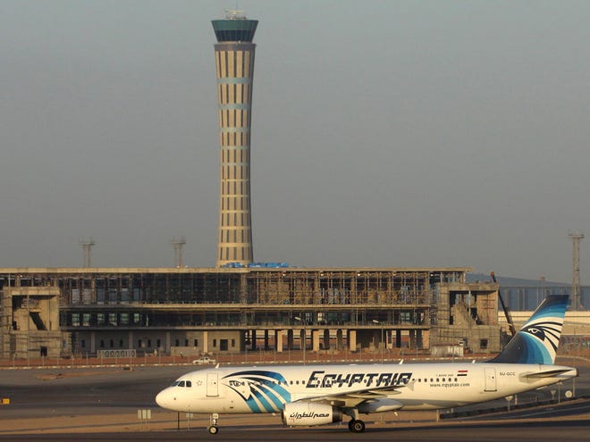 In this Dec. 10, 2014 image an EgyptAir Airbus A320 with the registration SU-GCC is on the tarmac at Cairo airport. Egyptian aviation officials said on Thursday that an EgyptAir flight MS804 with the registration SU-GCC, travelling from Paris to Cairo with 66 passengers and crew on board, has crashed.